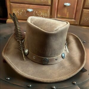 Minnetonka leather outback Buffalo head nickel hat with added feathers